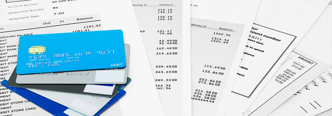 Selection of Credit Cards on top of Bank Statements.