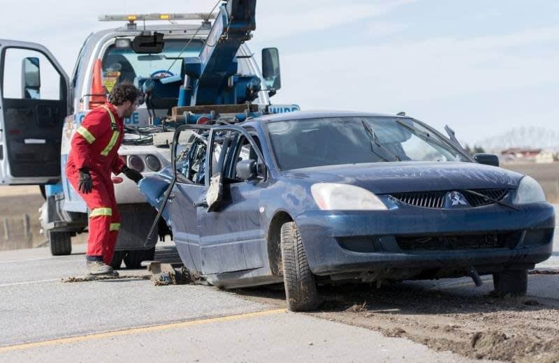 tow truck towing a car